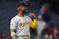 Pittsburgh Pirates' Andrew McCutchen reacts after the Pirates defeated the Los Angeles...