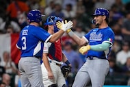 Italy right fielder Jac Caglianone (14) celebrates a home run against the United States with...