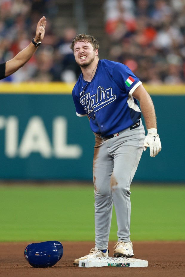 Team Italy's Kyle Teel grabs his right hamstring after hitting a double against Team USA in the sixth inning during the World Baseball Classic at Daikin Park on March 10, 2026, in Houston. (Kenneth Richmond/Getty)