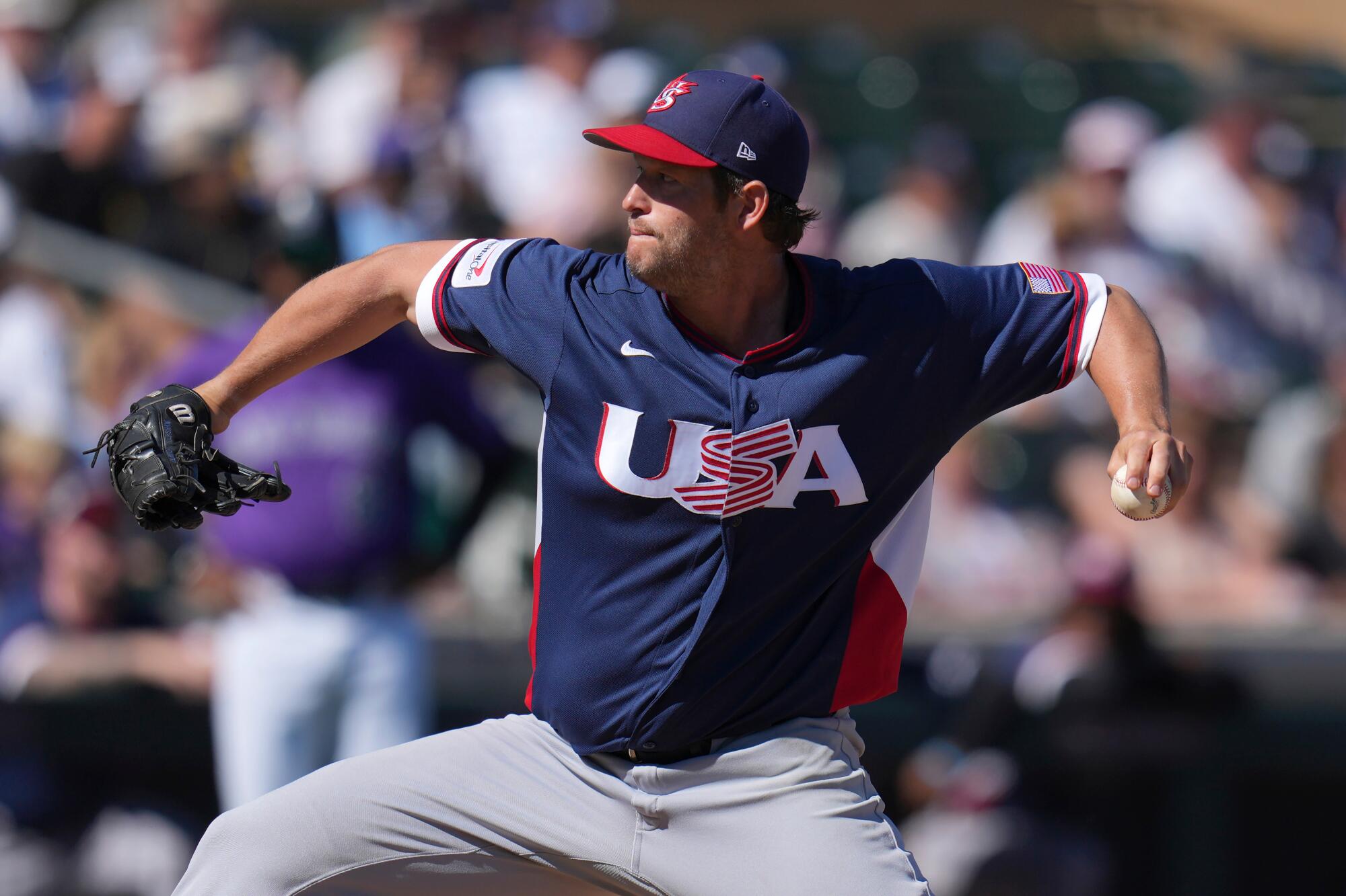 U.S. pitcher Clayton Kershaw delivers during an exhibition game against the Colorado Rockies on March 4.