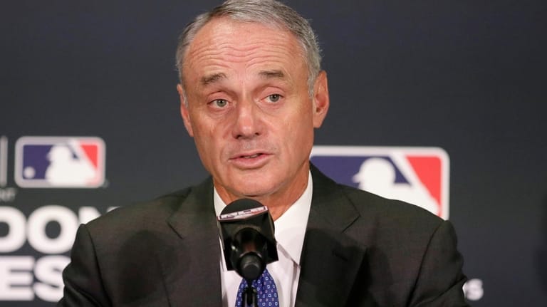 Major League Baseball commissioner Rob Manfred speaks during a news...