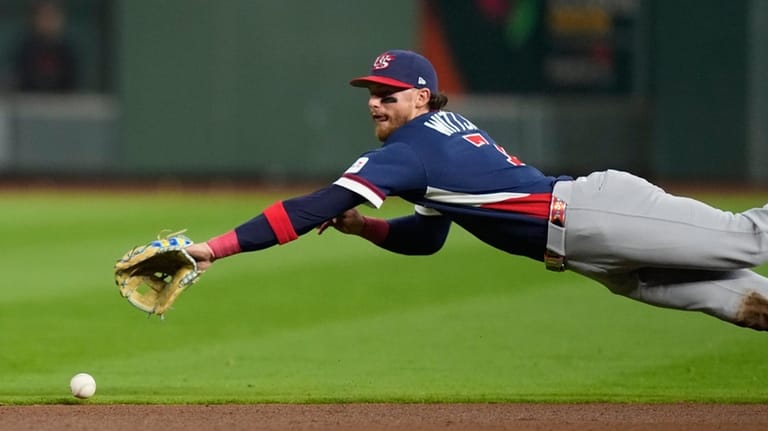 United States shortstop Bobby Witt Jr. (7) dives for a...