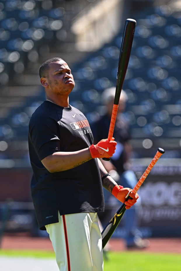 San Francisco Giants' Rafael Devers (16) examines his bat during batting practice before their MLB game against the Boston Red Sox at Oracle Park in San Francisco, Calif., on Friday, June 20, 2025. (Jose Carlos Fajardo/Bay Area News Group)