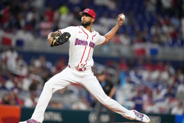 Dominican Republic starting pitcher Cristopher Sanchez pitches during the first inning of a World Baseball Classic quarterfinal game against South Korea, Friday, March 13, 2026, in Miami. (AP Photo/Lynne Sladky