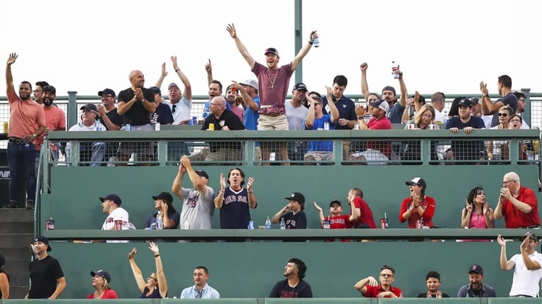 Fans in the Green Monster at Fenway Park