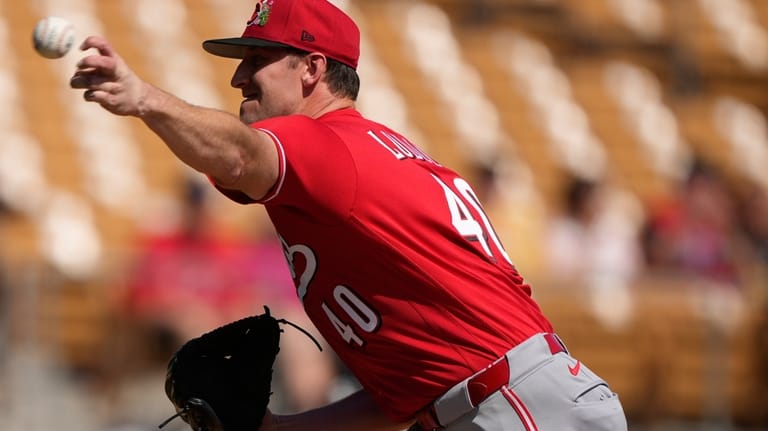 Cincinnati Reds pitcher Nick Lodolo (40) delivers in the first...