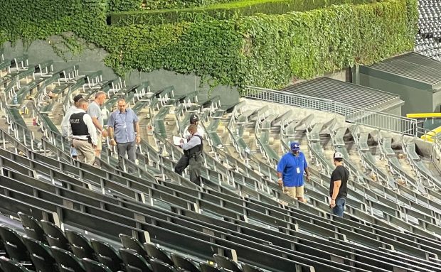 Chicago police work in the left field seats after a reported shooting at the White Sox game at Guaranteed Rate Field on Aug. 25, 2023. (Kaarin Tisue/Chicago Tribune)