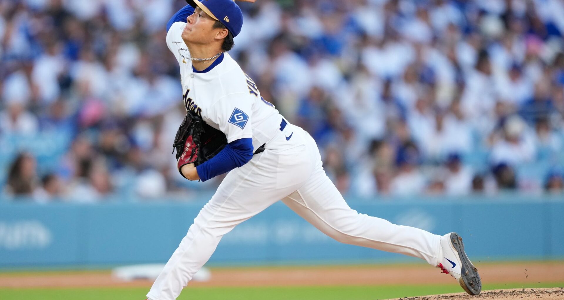 Dodgers open defense of back-to-back World Series titles with a win