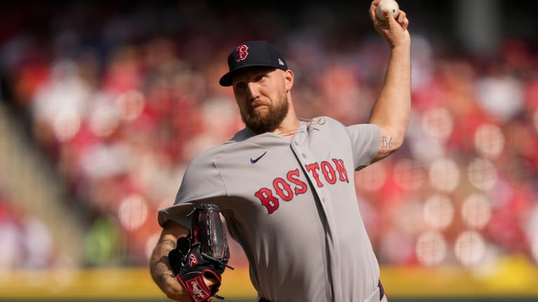 Boston Red Sox pitcher Garrett Crochet throws during the first...