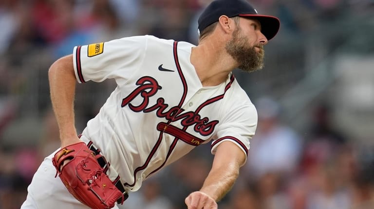 Atlanta Braves pitcher Chris Sale (51) deliveres in the first...