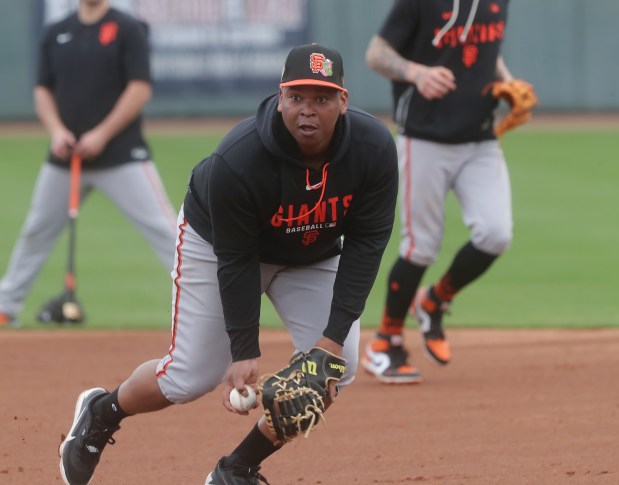 San Francisco Giants infielder Rafael Devers #16 takes infield practice during the San Francisco Giants spring training workout at Scottsdale Stadium on February 16, 2026 in Scottsdale, Arizona.(John Medina/Special to Bay Area News Group)
