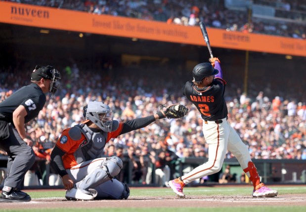 San Francisco Giants' Willy Adames (2) follows his solo home run against the Baltimore Orioles in the first inning of their MLB game at Oracle Park in San Francisco, Calif., on Saturday, Aug. 30, 2025. (Ray Chavez/Bay Area News Group)