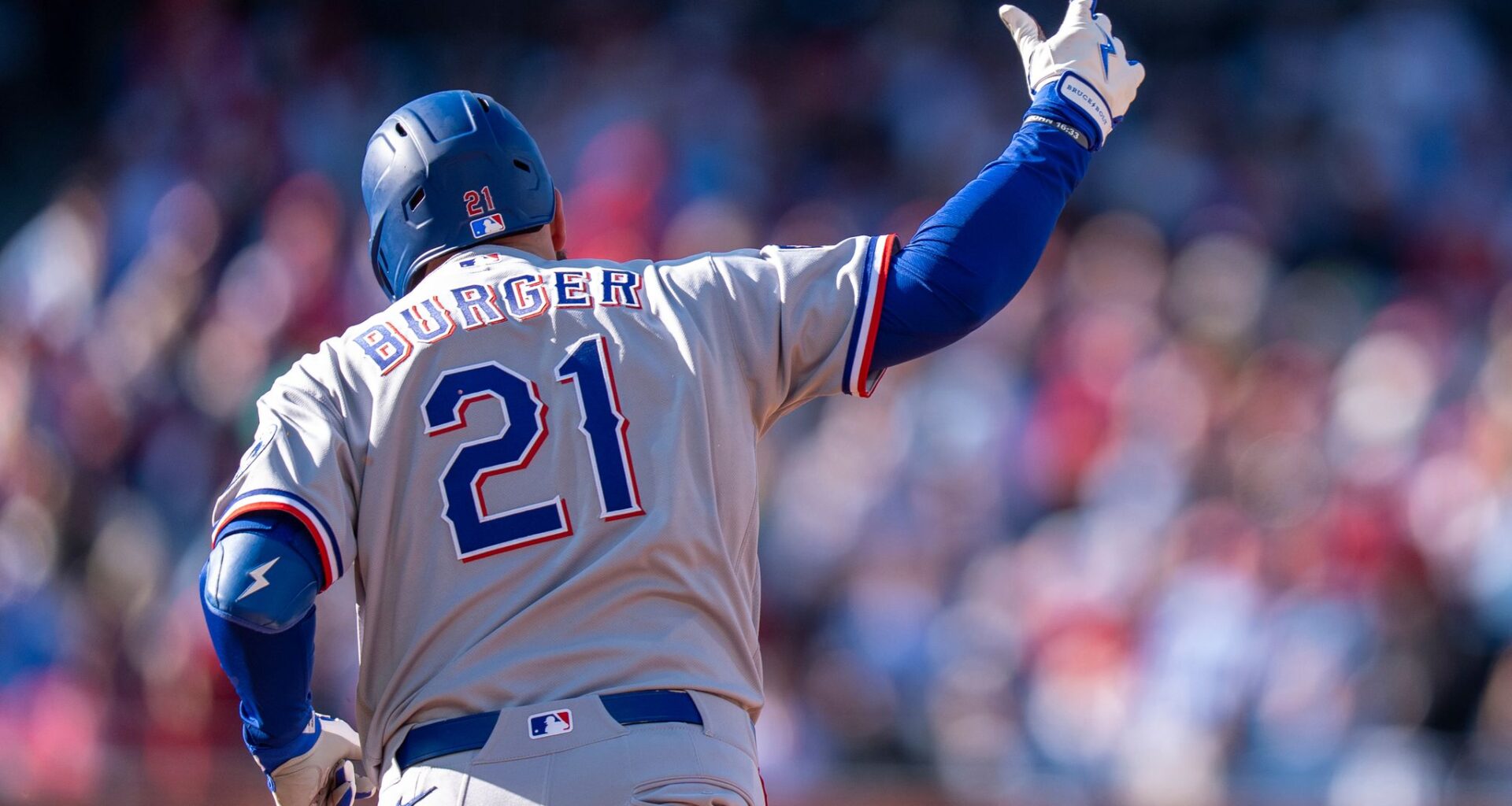 Rangers blow 3-run lead in 9th inning but recover to top Phillies 5-4 in the 10th