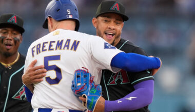 Arizona Diamondbacks second baseman Ketel Marte, right, hugs Los Angeles Dodgers