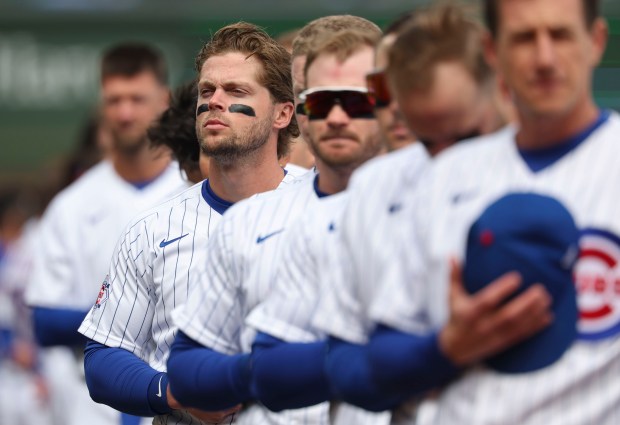 Chicago Cubs second baseman Nico Hoerner stands with teammates for the national anthem Thursday, March 26, 2026, on opening day at Wrigley Field. (Brian Cassella/Chicago Tribune)