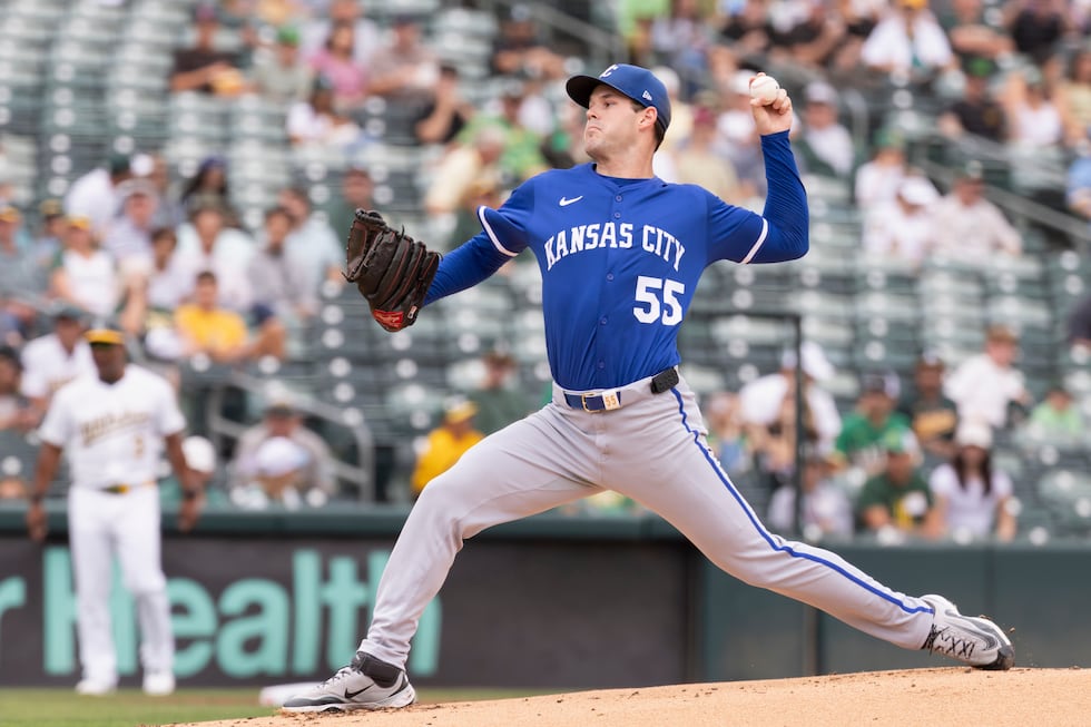 Kansas City Royals pitcher Cole Ragans throws to the Athletics during the first inning of a...
