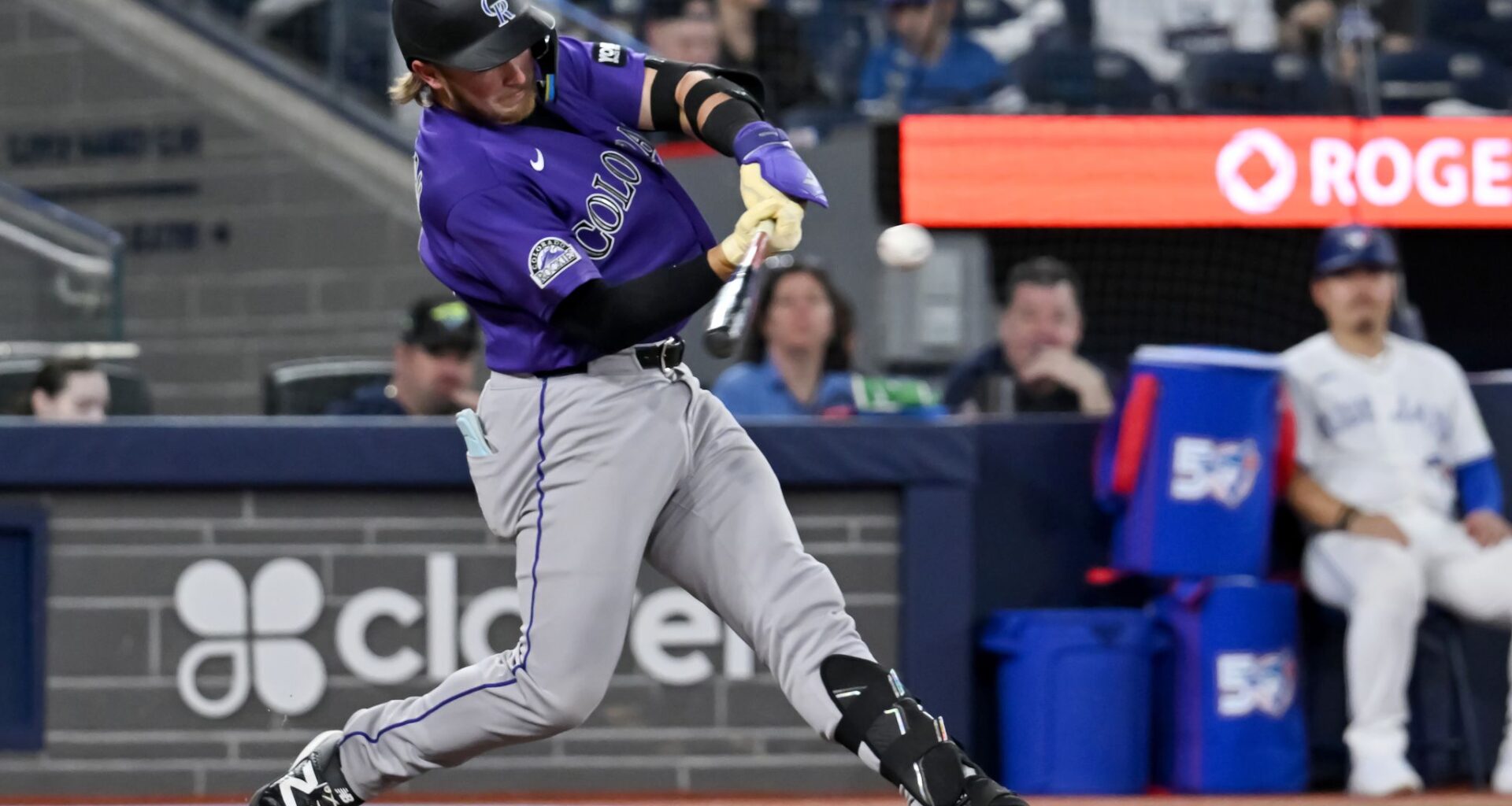 Johnston hits a 2-run homer as the Rockies rout the Blue Jays 14-5 for their 1st win of the season