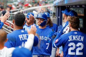 ATLANTA, GEORGIA - MARCH 29: Bobby Witt Jr. #7 of the Kansas City Royals reacts with teammates after scoring during the eighth inning against the Atlanta Braves at Truist Park on March 29, 2026 in Atlanta, Georgia. (Photo by Todd Kirkland/Getty Images)