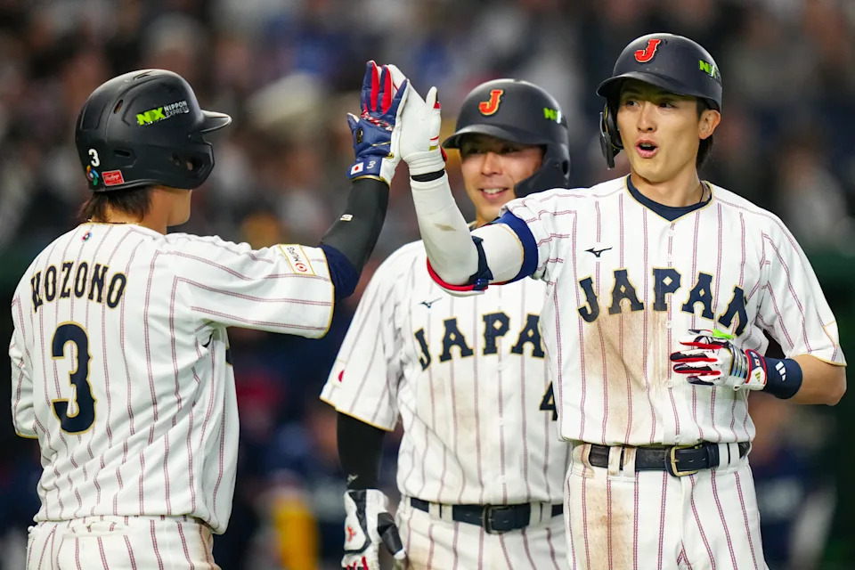TOKYO, JAPAN - MARCH 10: Ukyo Shuto #20 of Team Japan celebrates with Kaito Kozono #3 at home plate after hitting a three-run home run in the eighth inning during the 2026 World Baseball Classic Pool C game presented by dip between Team Czech Republic and Team Japan at Tokyo Dome on Tuesday, March 10, 2026 in Tokyo, Japan. (Photo by Daniel Shirey/WBCI/MLB Photos via Getty Images) | MLB Photos via Getty Images