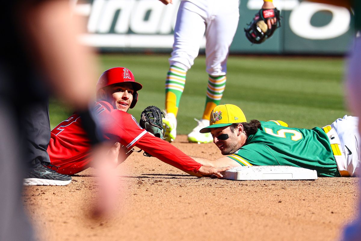 Los Angeles Angels INF Nick Madrigal (2) is tagged out at second by Athletics INF Jacob Wilson (5) on Saturday March 7, 2026, in Las Vegas, Nevada. 