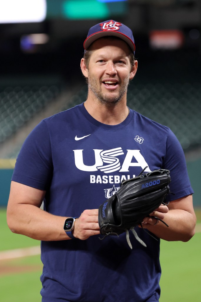 United States pitcher Clayton Kershaw (22) looks on during batting practice before the game against Great Britain at Daikin Park