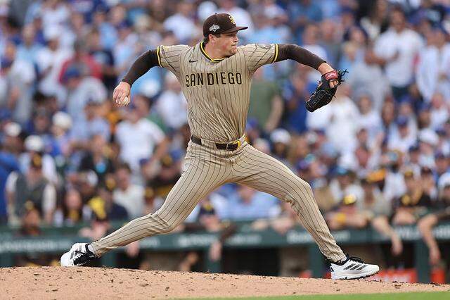CHICAGO - OCT. 1: Mason Miller (22) of the San Diego Padres throws a pitch in the seventh inning against the Chicago Cubs during game two of the National League Wild Card Series at Wrigley Field on Oct. 1, 2025, in Chicago.