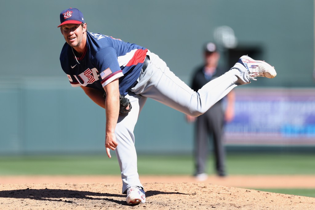  Relief pitcher Clayton Kershaw #22 of Team United States pitches against the Colorado Rockies during the fourth inning of the MLB exhibition game at Salt River Fields at Talking Stick on March 04, 2026 in Scottsdale, Arizona. 