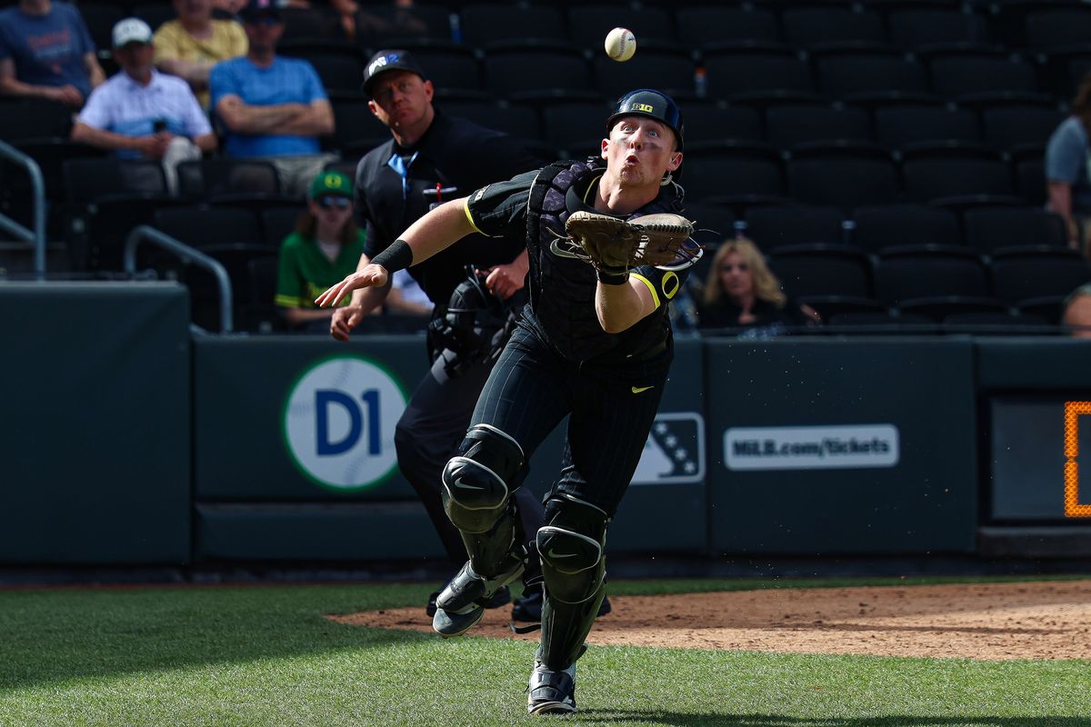Oregon Ducks C Burke-Lee Mabeus (5) watches the ball prior to making a clutch out in the ninth inning of a college baseball game against the Vanderbilt Commodores at the 2026 Live Like Lou Las Vegas College Baseball Classic on Sunday, March 1, 2026 at Las Vegas Ballpark in Las Vegas, Nevada. Oregon Ducks C Burke-Lee Mabeus (5) watches the ball prior to making a clutch out in the ninth inning of a college baseball game against the Vanderbilt Commodores at the 2026 Live Like Lou Las Vegas College Baseball Classic on Sunday, March 1, 2026 at Las Vegas Ballpark in Las Vegas, Nevada.