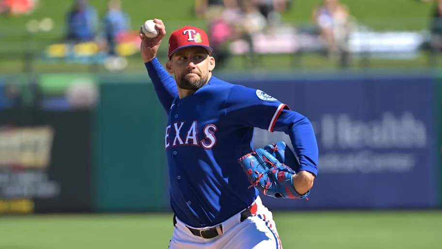 Texas Rangers pitcher Nathan Eovaldi throws a baseball.