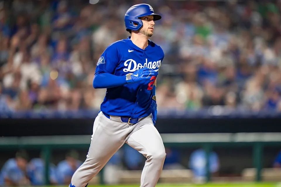 Los Angeles Dodgers outfielder Kyle Tucker (23) running to first during a ground out during an MLB spring training baseball game against the Kansas City Royals on March 17th, 2026 in Surprise, AZ.