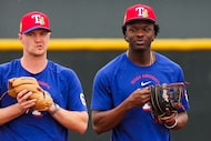 Texas Rangers infielder Sebastian Walcott (right) and third baseman Josh Jung participate in...