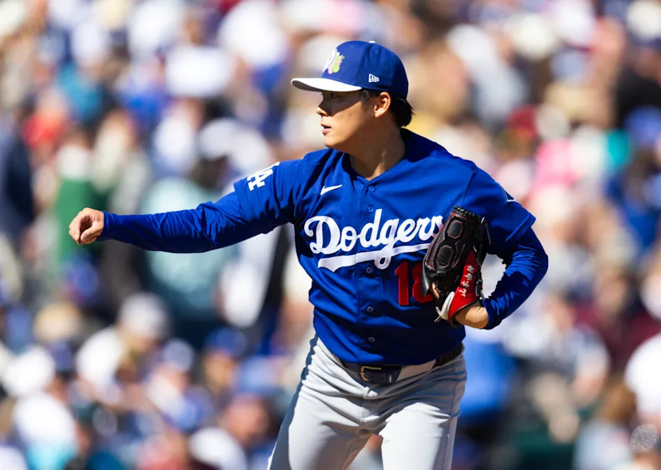 Feb 21, 2026; Tempe, Arizona, USA; Los Angeles Dodgers pitcher Yoshinobu Yamamoto against the Los Angeles Angels during a spring training game at Tempe Diablo Stadium. Mandatory Credit: Mark J. Rebilas-Imagn Images