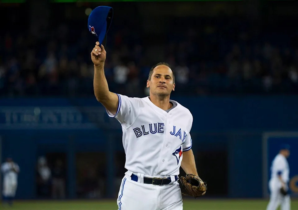 Toronto Blue Jays shortstop Omar Vizquel waves to the crowd as he leaves the field for the very last time while playing against the Minnesota Twins during ninth AL baseball action in Toronto on Wednesday, Oct. 3, 2012. Vizquel retires after this game. THE CANADIAN PRESS/Nathan Denette