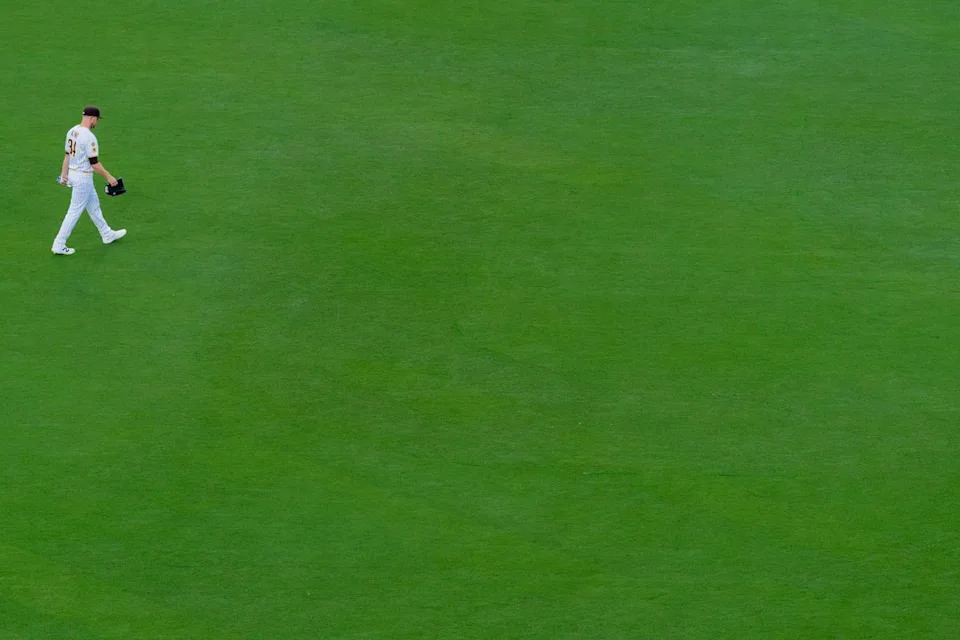 San Diego Padres starting pitcher Michael King (34) walks through the outfield before an MLB game between the Detroit Tigers and the San Diego Padres, Friday March 27, 2026 at Petco Park in San Diego, Calif.