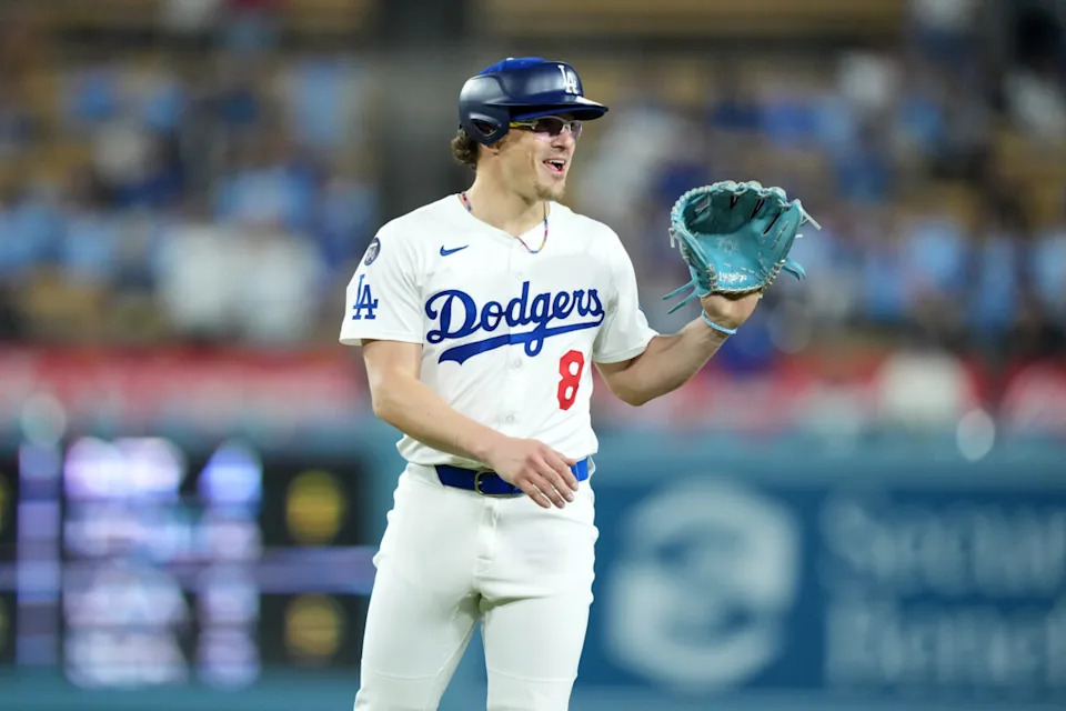 Apr 29, 2025; Los Angeles, California, USA; Los Angeles Dodgers first baseman Kike Hernandez (8) pitches in the ninth inning against the Miami Marlins at Dodger Stadium. Mandatory Credit: Kirby Lee-Imagn Images