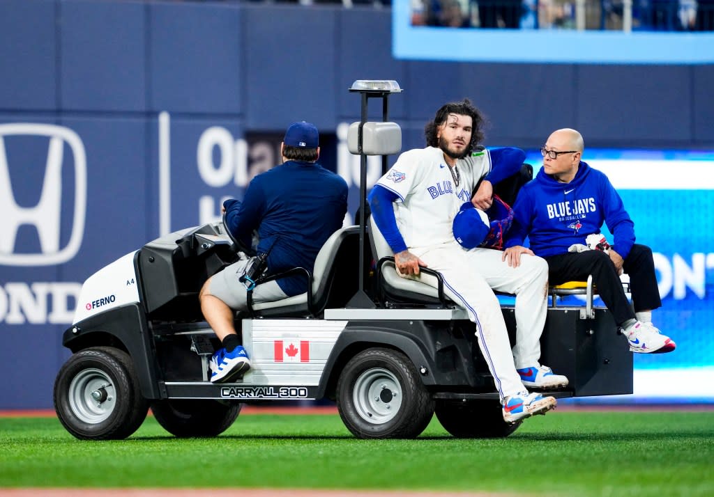 Cody Ponce #66 of the Toronto Blue Jays is carted off the field with an injury in a break in play against the Colorado Rockies during the third inning in their MLB game at the Rogers Centre on March 30, 2026. Getty Images