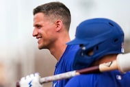 Texas Rangers shortstop Corey Seager waits his turn to hit live batting practice a spring...