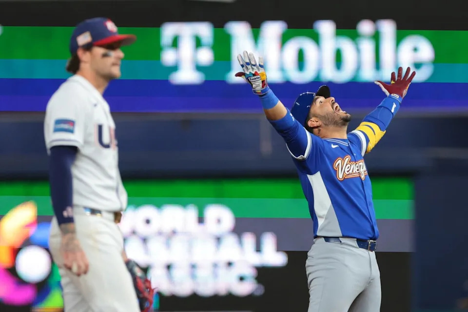 Mar 17, 2026; Miami, FL, United States; Venezuela third baseman Eugenio Suarez (7) reacts after hitting a RBI double against the United States in the ninth inning during the 2026 World Baseball Classic Championship game at loanDepot Park. Mandatory Credit: Sam Navarro-Imagn Images