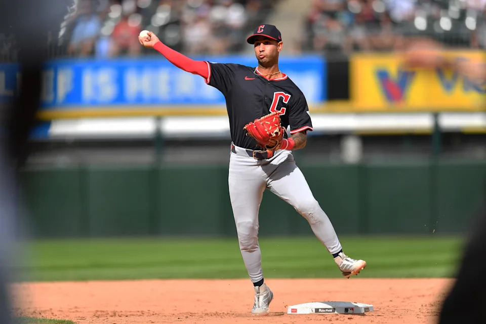 Jul 12, 2025; Chicago, Illinois, USA; Cleveland Guardians shortstop Brayan Rocchio (4) completes a double play during the fourth inning against the Chicago White Sox at Rate Field. Mandatory Credit: Patrick Gorski-Imagn Images