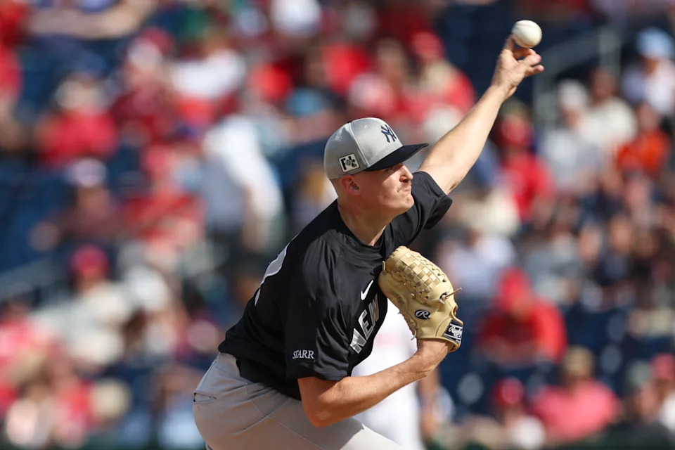 Mar 4, 2025; Clearwater, Florida, USA; New York Yankees pitcher Brent Headrick (97) throws a pitch against the Philadelphia Phillies in the eighth inning during spring training at BayCare Ballpark. Mandatory Credit: Nathan Ray Seebeck-Imagn Images