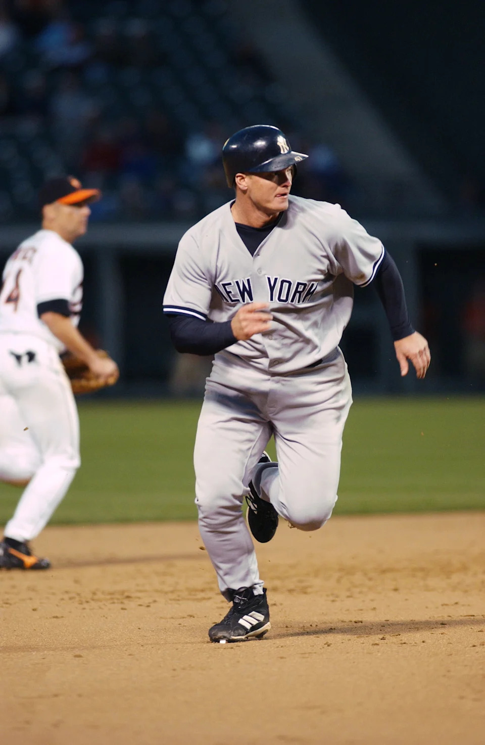 Shane Spencer of the New York Yankees runs towards home against the Baltimore Orioles during Opening Day at Camden Yards in Baltimore, Maryland.