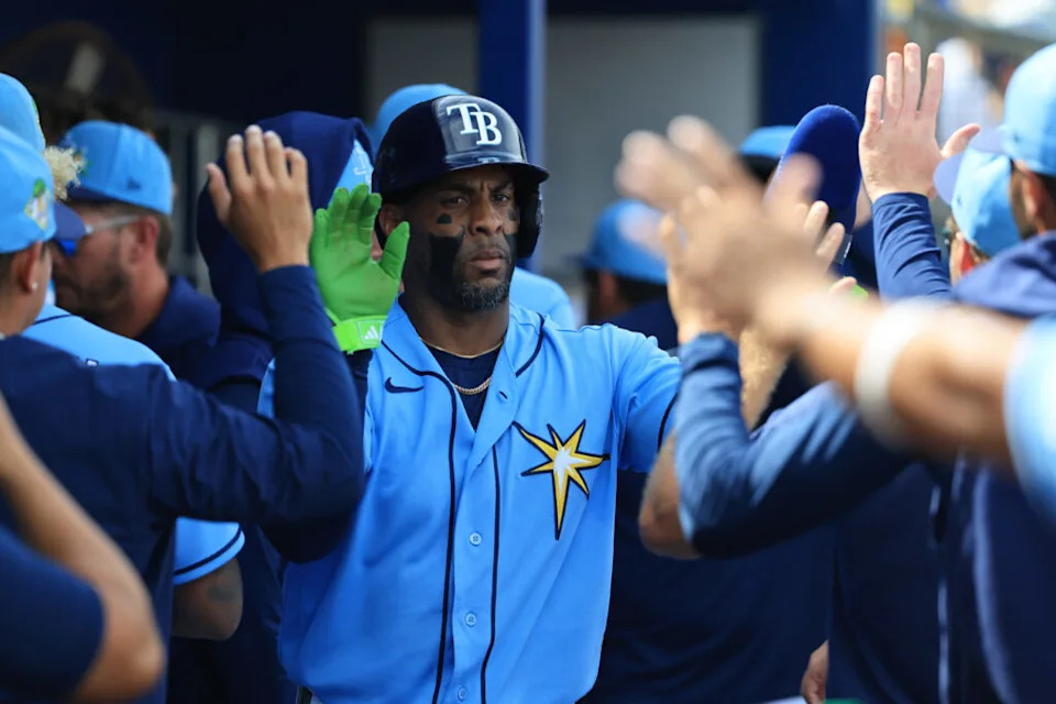 Feb 27, 2026; Port Charlotte, Florida, USA; Tampa Bay Rays first baseman Yandy Diaz (2) is congratulated after he scored a run during the first inning against the Toronto Blue Jays at Charlotte Sports Park. Mandatory Credit: Kim Klement Neitzel-Imagn Images