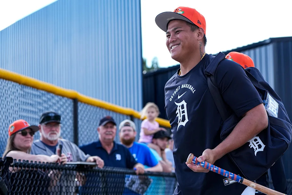 Detroit Tigers infielder Hao-Yu Lee smiles as he walks towards the practice field during spring training at TigerTown in Lakeland, Fla. on Sunday, Feb. 15, 2026.