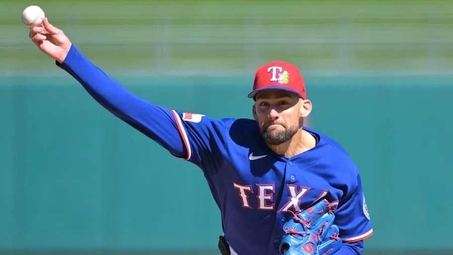 Texas Rangers pitcher Nathan Eovaldi throws a baseball.