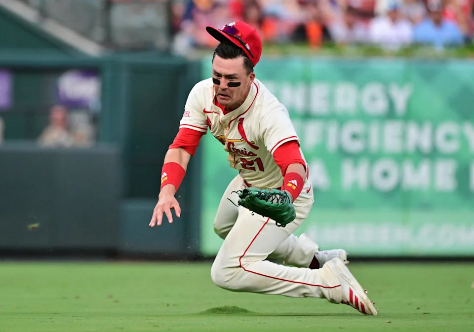 St. Louis Cardinals outfielder Lars Nootbaar (21) makes the catch on a fly ball to left field by San Francisco Giants catcher Patrick Bailey (14) in the second inning at Busch Stadium. Tim Vizer-Imagn Images