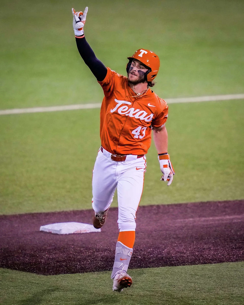 Texas Longhorns outfielder Aiden Robbins (43) puts his “horns up” after hitting a home run in the first inning as the Longhorns play the UTRGV Vaqueros at UFCU Disch-Falk Field in Austin, Feb. 24, 2026. (Sara Diggins/Austin American-Statesman)