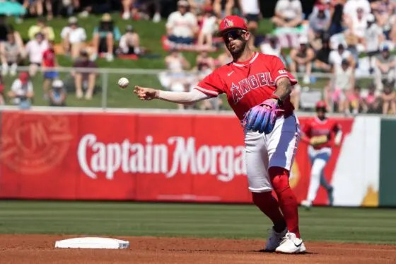 Los Angeles Angels shortstop Zach Neto (9) makes the play against the Cleveland Guardians in the first inning at Tempe Diablo Stadium.