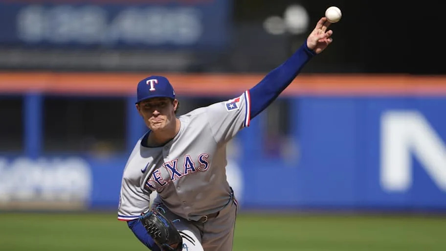 Texas Rangers pitcher Jacob Latz throws a baseball.