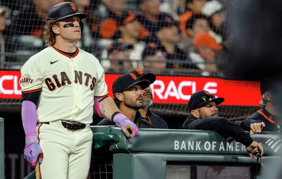 Harrison Bader (9) and manager Tony Vitello watch the final out as the San Francisco Giants played the New York Yankees in their 2026 Opening Day at Oracle Park in San Francisco, on Wednesday, March 25, 2026. The Giants were defeated 7-0. (Carlos Avila Gonzalez/S.F. Chronicle)