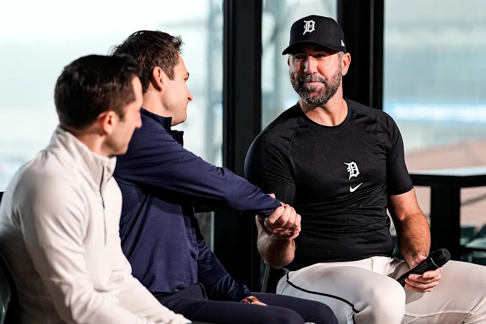 Detroit Tigers pitcher Justin Verlander, right, shakes hands with president of baseball operations Scott Harris during his introductory press conference at the 34 Club of Joker Marchant Stadium on Thursday, Feb. 12, 2026.